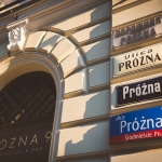 Warsaw's street signs from different decades.