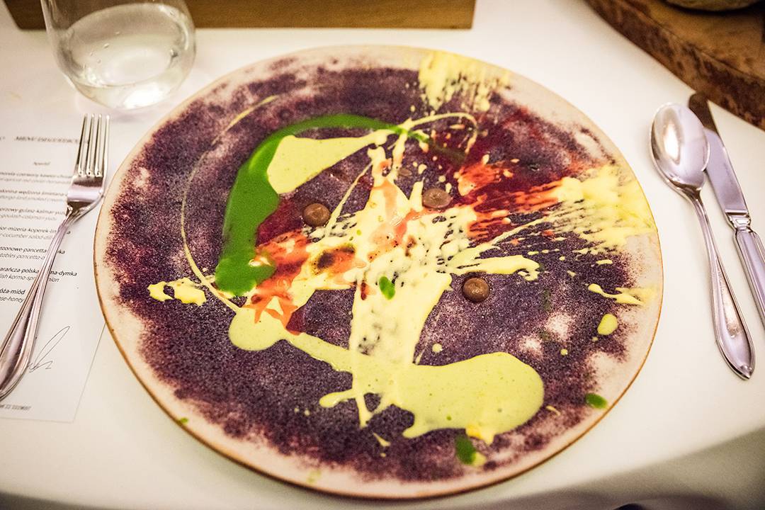 In Warsaw, we took my boyfriend's family for a tasting menu at Senses, which is one of two restaurants in Poland with a Michelin star. It was less than $100 for seven listed courses and a million little surprises! This dish of kobe ribs with oyster, blood orange, and spring onion included this plate of "Polish korma", their take on Indian curry using Polish ingredients. It was an amazing experience, one of the best tasting menus I've ever had, served by a wonderful staff who wanted to delight us. My whole review is on donuts4dinner.com now.