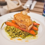 Lunch that day in Krakow was at Gruszka Nowa (New Pear), where I had the chicken with pearl barley, parsley pesto, and spicy caramelized carrots. The main reason I chose this place was the amazing location right off of the main square with horse-drawn carriages clomping by and outdoor seating right on the street, but the complimentary bread with lard spread didn't hurt, either. Poland is also where I became hopelessly addicted to sparkling water, partly because "woda gazowana" is so fun to say. That blue bottle is a liter that I basically finished myself in the five minutes before our bread arrived.
